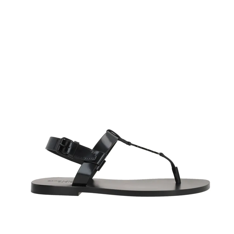 Saint Laurent Cassandre 05 Flat Sandals sold by Siebentaschen