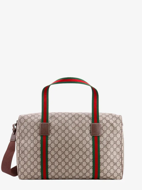 Gucci GG Supreme Fabric and leather travel bag with Web detail sold by Siebentaschen