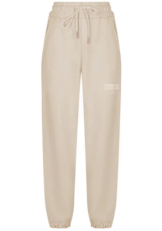 Comme Des Fuckdown Trousers Beige Woman sold by Siebentaschen