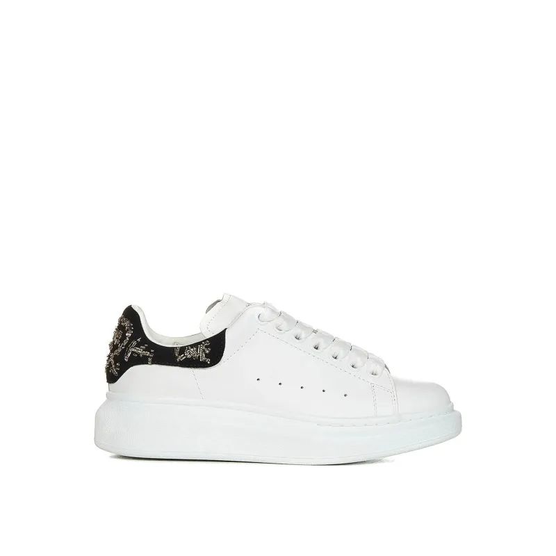 Alexander McQueen Oversized Leather Sneakers sold by Siebentaschen
