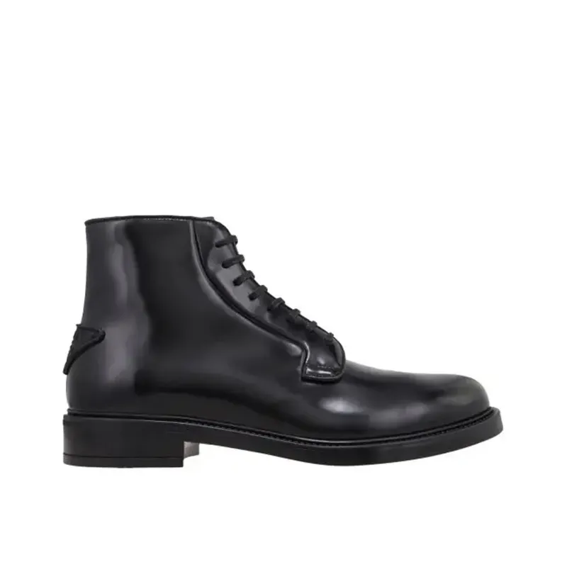 Prada Leather Lace-Up Boots sold by Siebentaschen