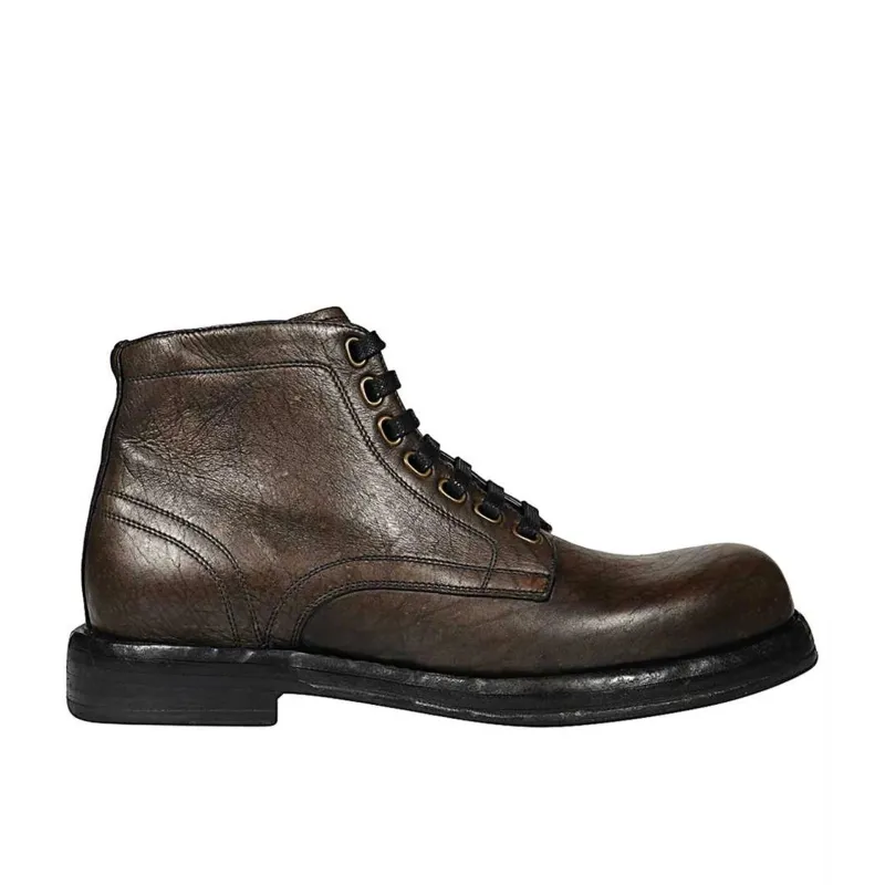 Dolce & Gabbana Leather Boots sold by Siebentaschen