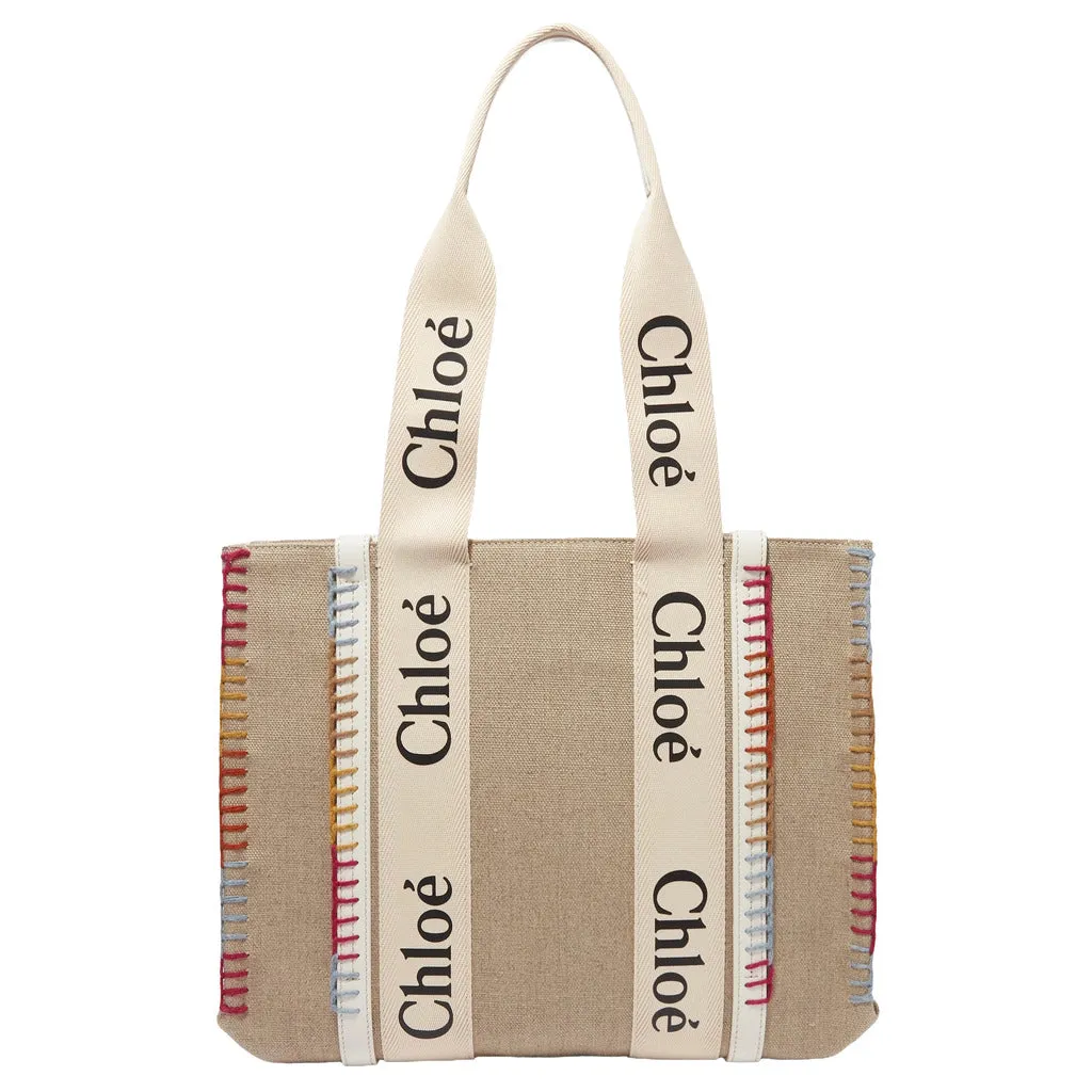 Chloè woody whipstitched canvas crossbody bag, beige sold by Siebentaschen