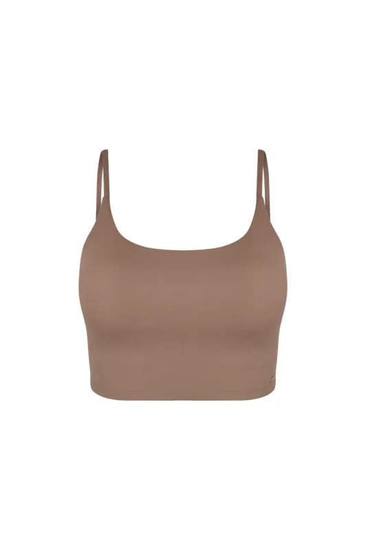 Essential top sold by Basix the Label