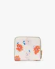 Morgan Dotty Floral Embossed Small Compact Wallet sold by Kate Spade