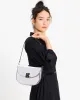 Dakota Metallic Saddle Bag sold by Kate Spade