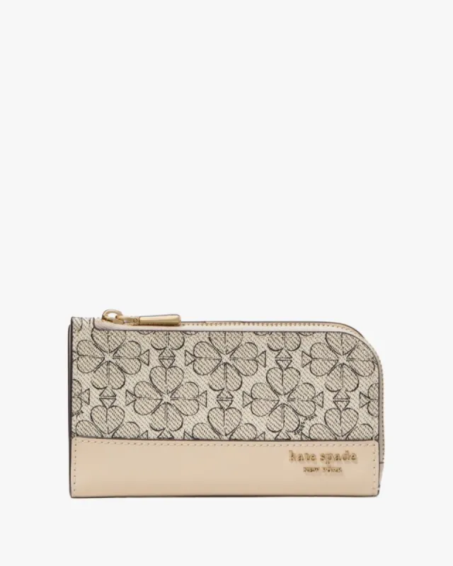 Spade Flower Small Slim Bifold Wallet sold by Kate Spade