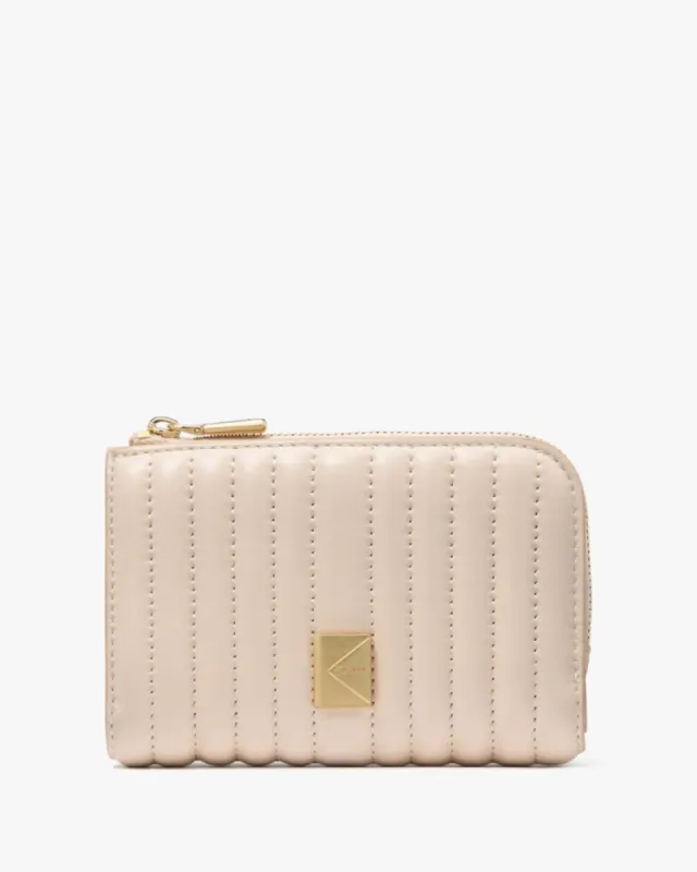 Deco Quilted Compact Wallet sold by Kate Spade