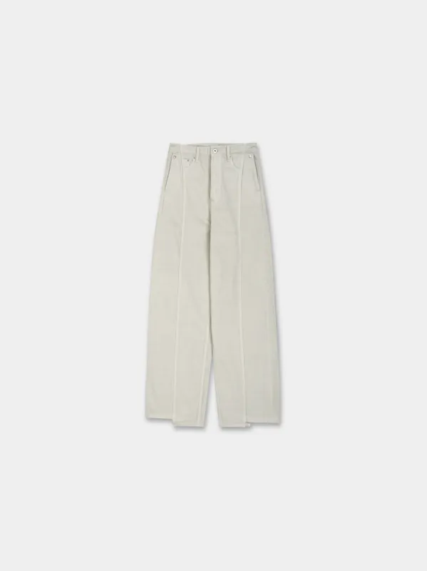 The “Diviser” Inside-Out Denim Trousers sold by vuja dè