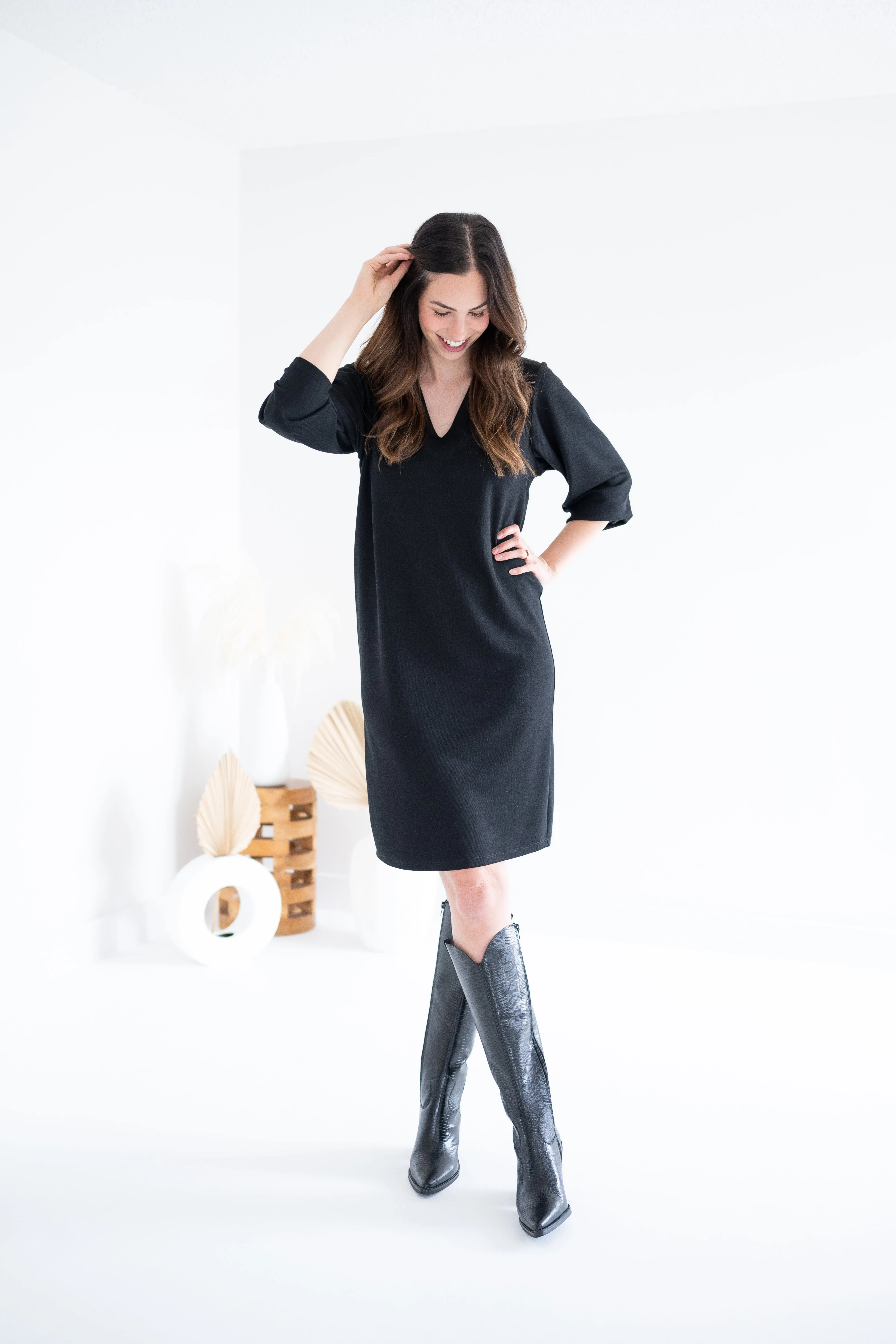 Ally V-neck Long Sleeved Sweater Dress in Black sold by Ang Hill