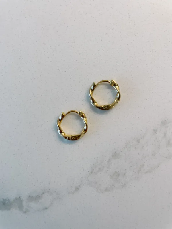 Twist Gold Plated Hoops sold by Ang Hill