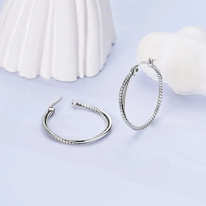 Elegant Twist Hoop Earrings sold by Pangama Jewelry product image thumbnail 2