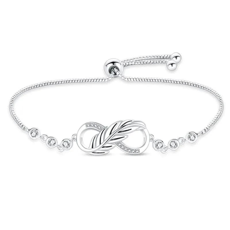 Elegant Infinity Knot Bracelet with Crystal Accents made by Pangama Jewelry