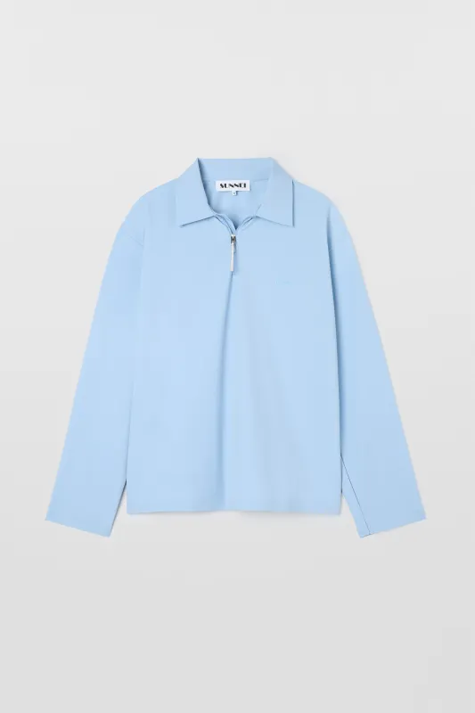 LONGSLEEVE POLO W ZIP / azure sold by Sunnei