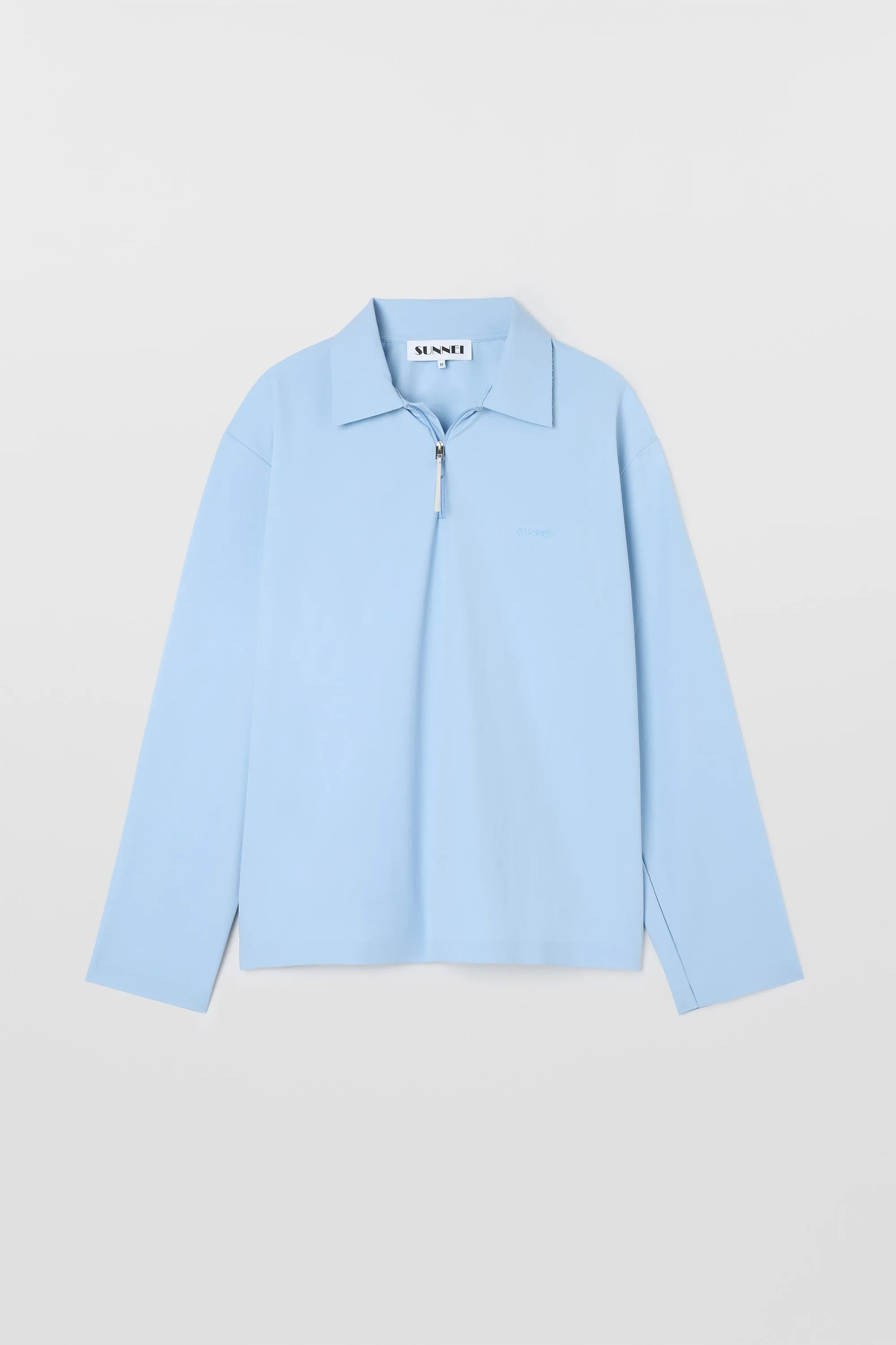 LONGSLEEVE POLO W ZIP / azure sold by Sunnei