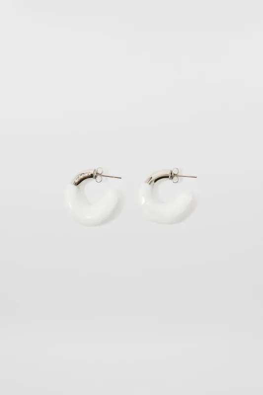 MINI RUBBERIZED EARRINGS SILVER / white glow sold by Sunnei