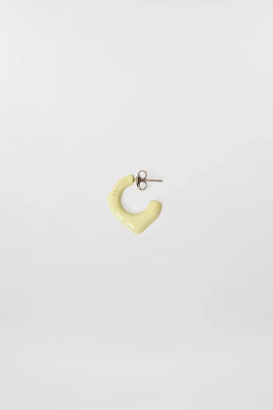 SINGLE METALLIZED EARRING / cream shiny sold by Sunnei