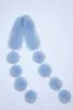 Bette Dreamy Pom-Pom Fur Scarf in Blue sold by PANN