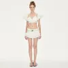 Dream Low-rise Layered Mini Shorts in White sold by PANN