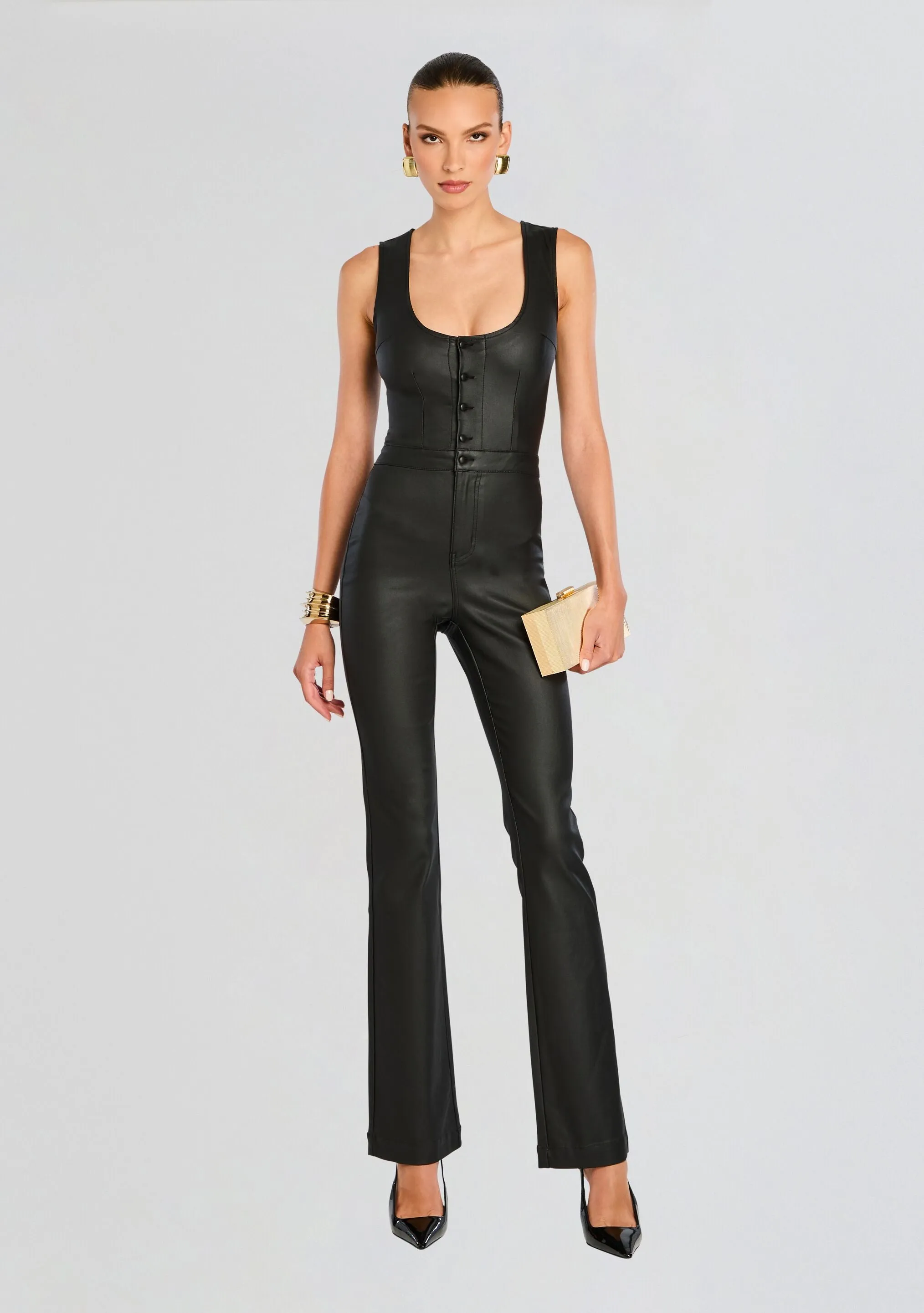 Mckinnon Coated Denim Jumpsuit sold by Retrofete