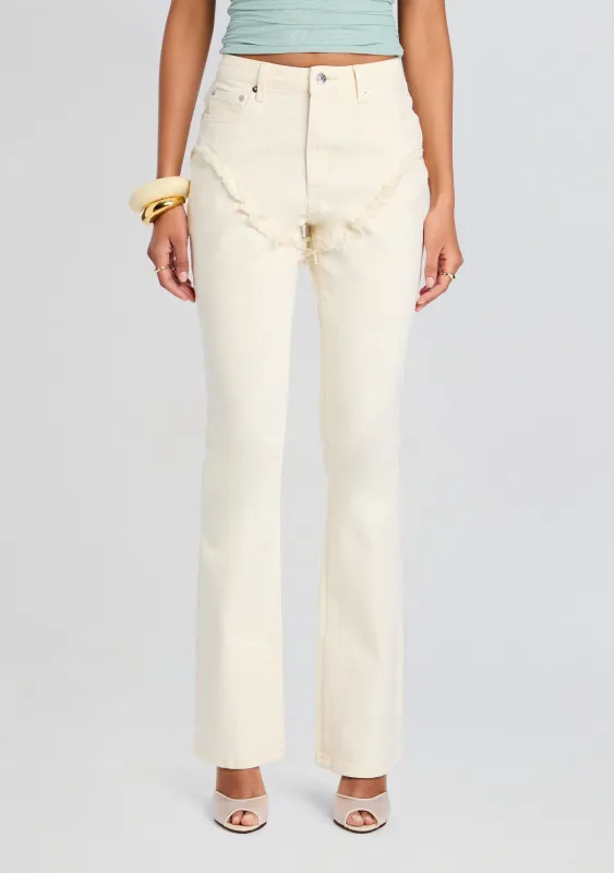 Dahlia Frayed Bootcut Jean sold by Retrofete