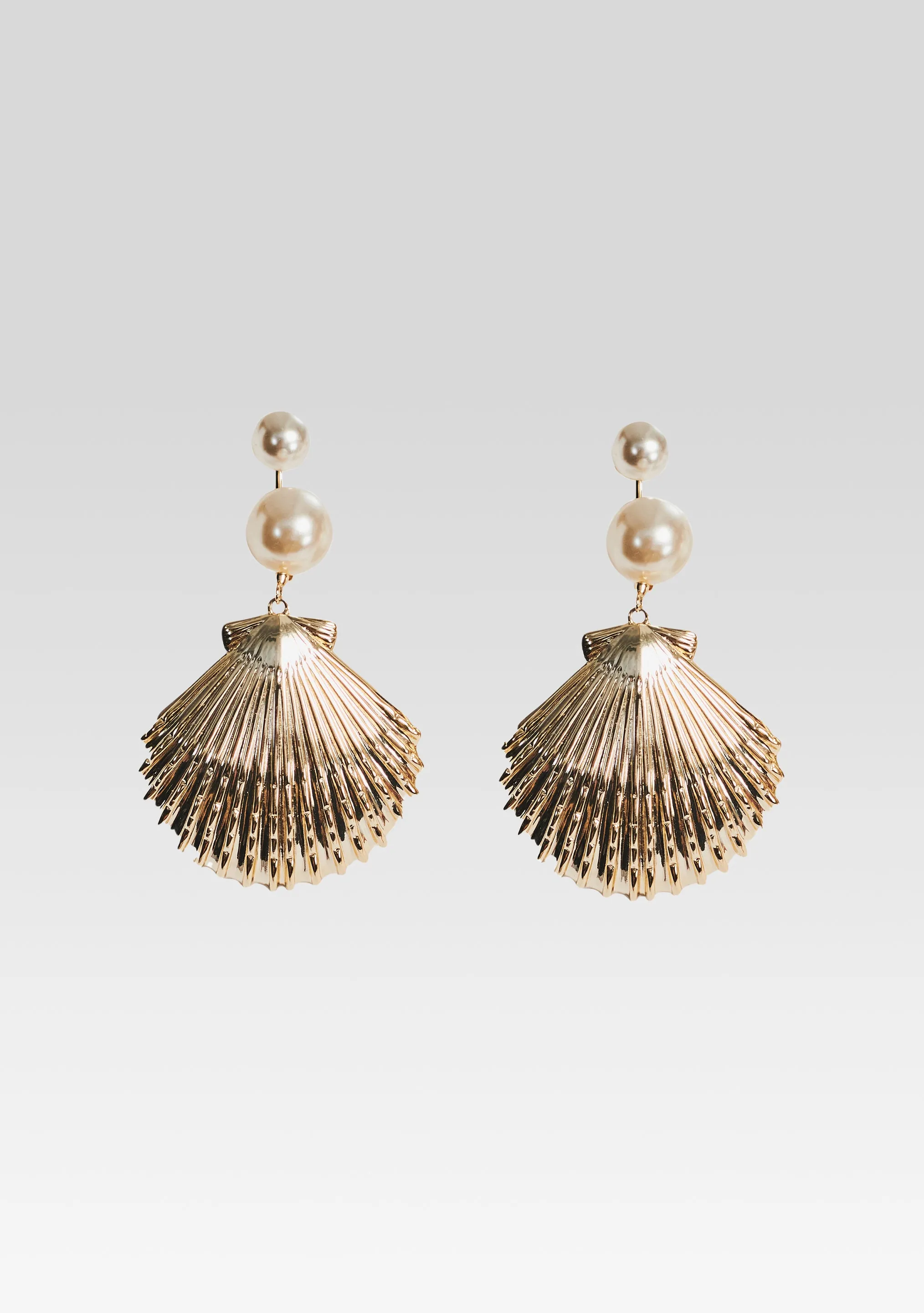 Perla Earrings sold by Retrofete