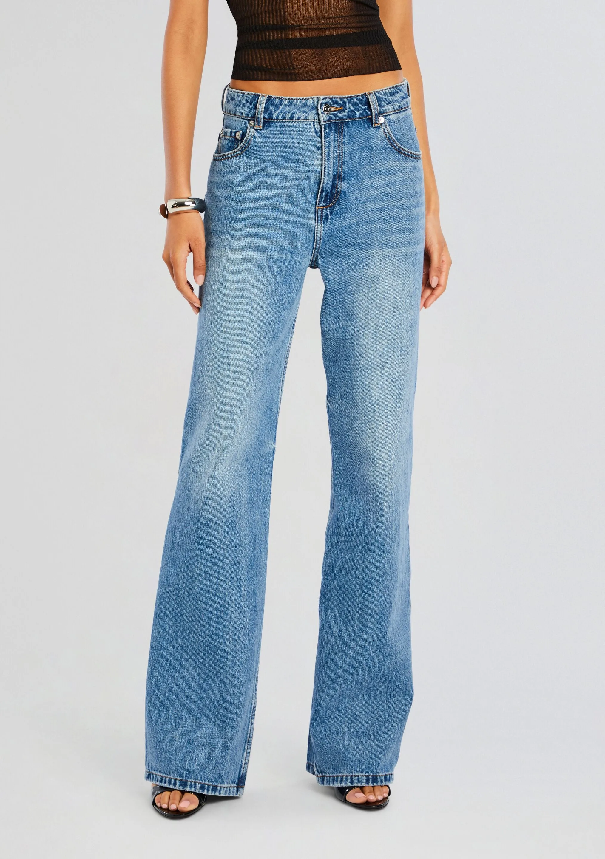 Arden High Rise Jean sold by Retrofete