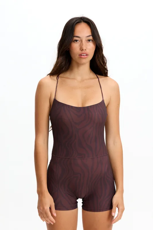 Benoa Active Cross Back Romper 3" in  Chocolate Zebra sold by Society Bikini