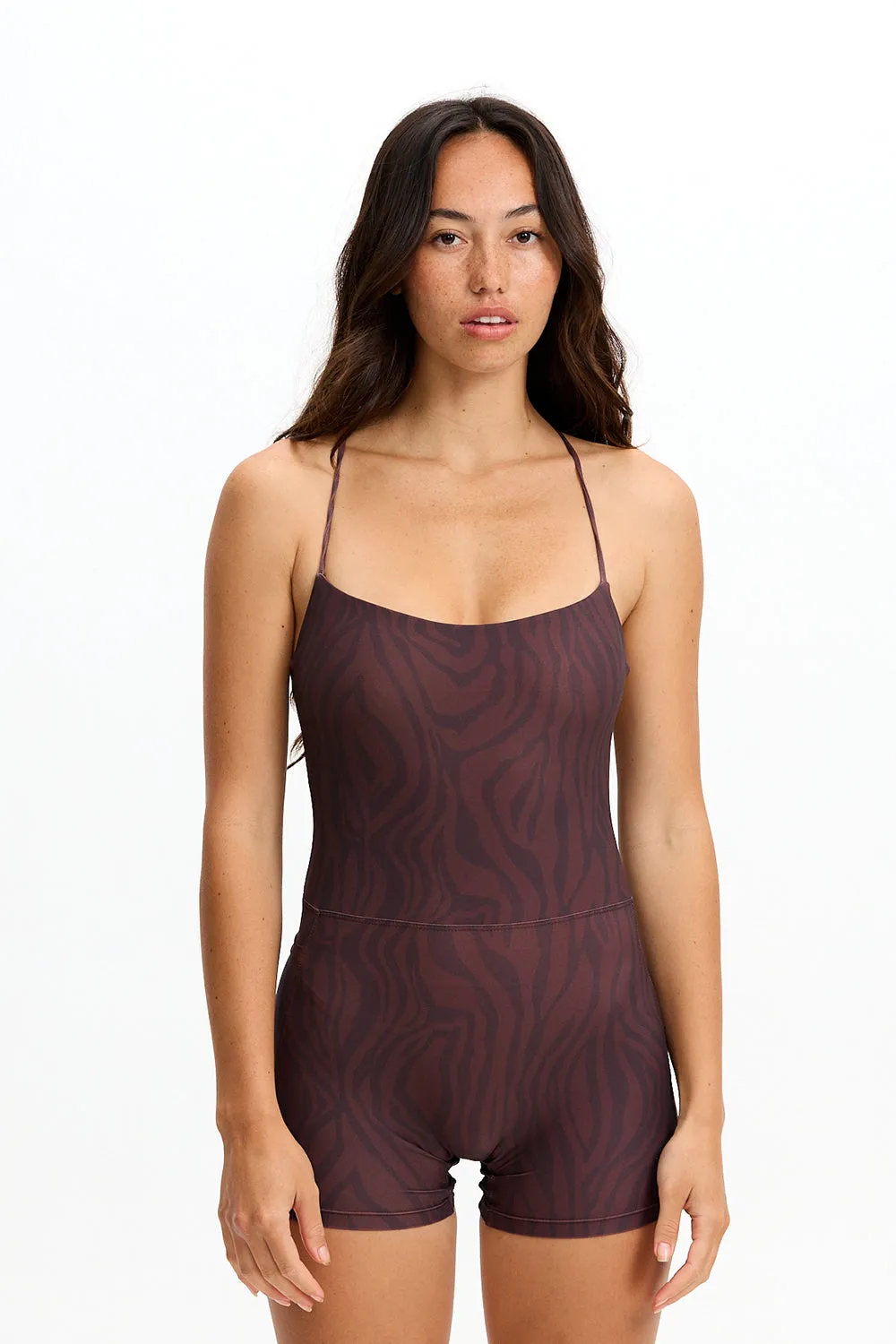 Benoa Active Cross Back Romper 3" in Chocolate Zebra sold by Society Bikini