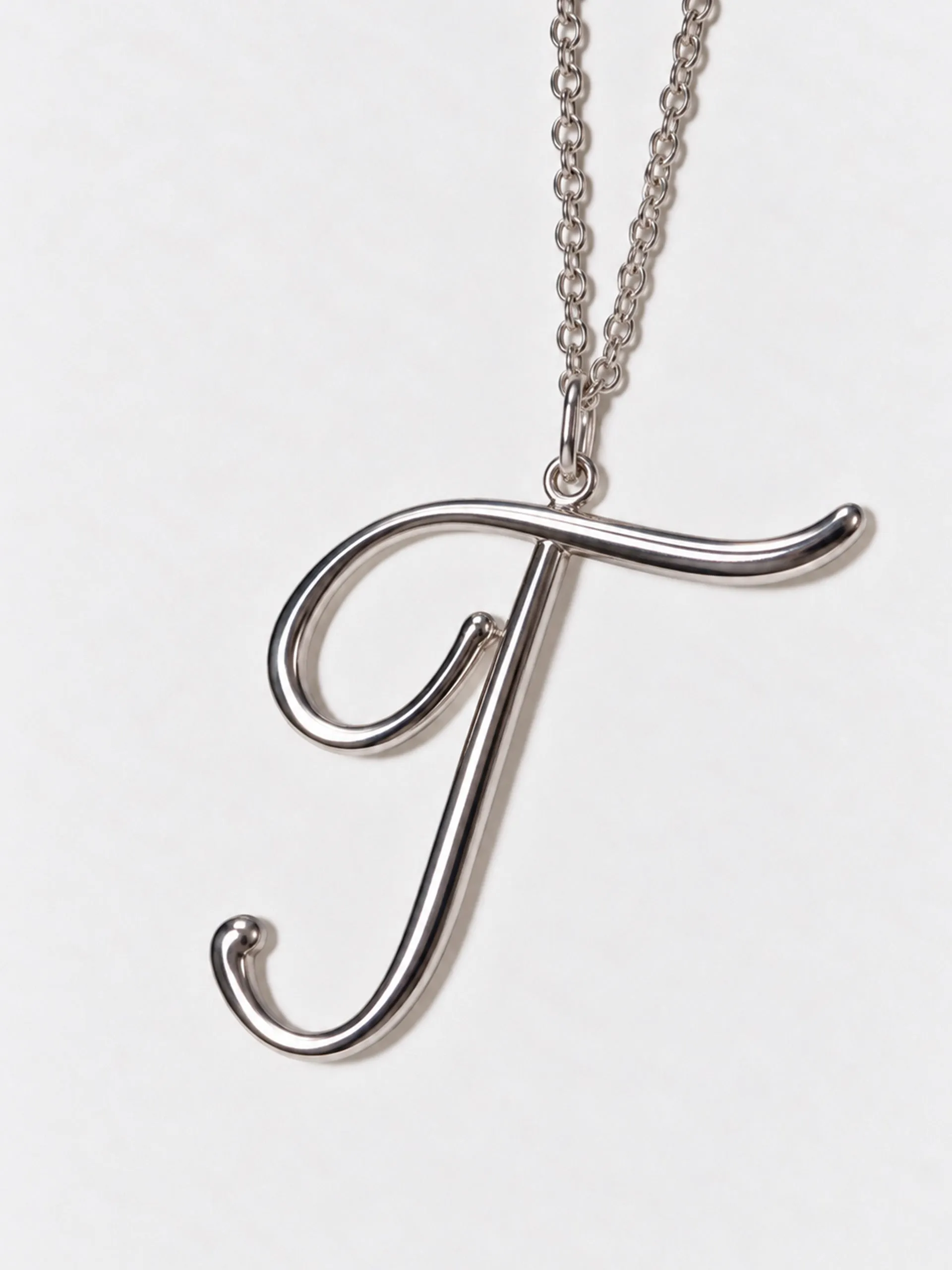 T Necklace sold by Gimaguas