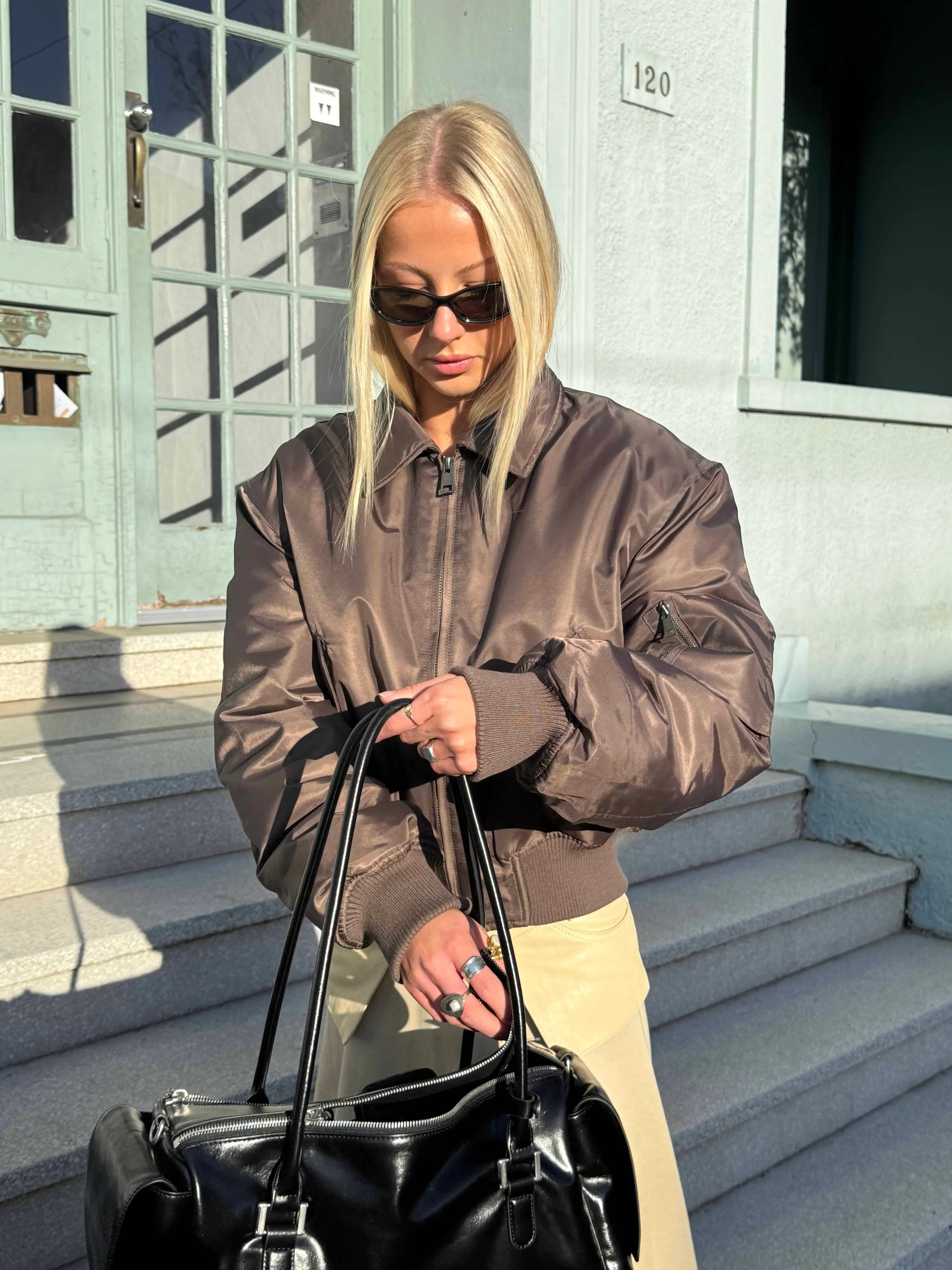 Chocolate Bomber Jacket sold by With Consideration