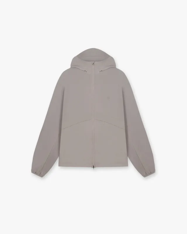 247 Hooded Training Jacket - Cinder sold by Represent