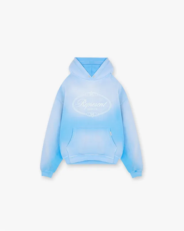 Represent X Harrods Crest Hoodie - Cloud Blue made by Represent