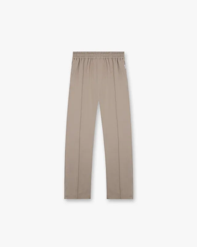 Initial Track Pant - Dune sold by Represent