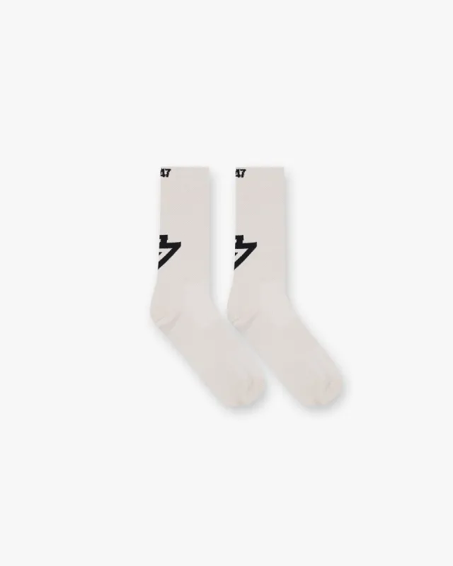 247 X Puma Race Socks - Cream made by Represent