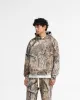 Realtree® Camo Boxy Hoodie - Camo sold by Represent