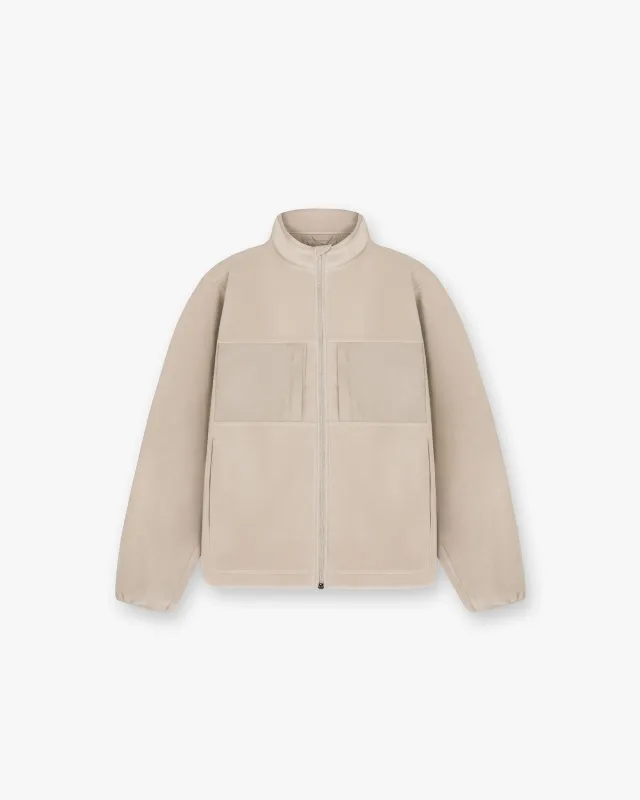 247 Polar Panelled Fleece - Pebble sold by Represent