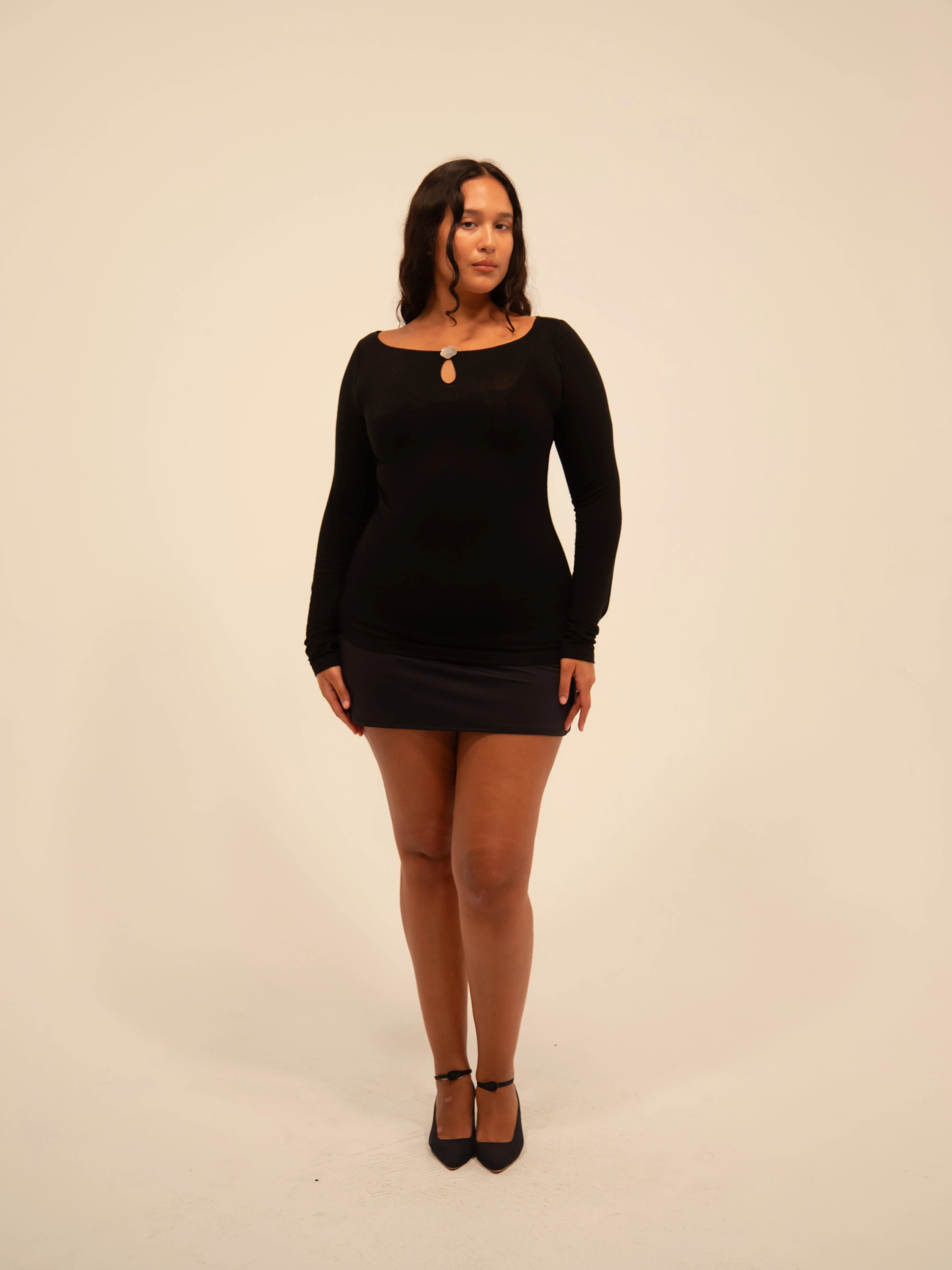 LONG SLEEVE FLOWER TOP IN BLACK sold by Buci