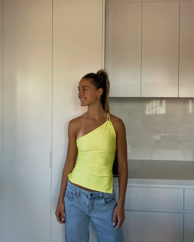 Bloom top (long) sold by Garments by El