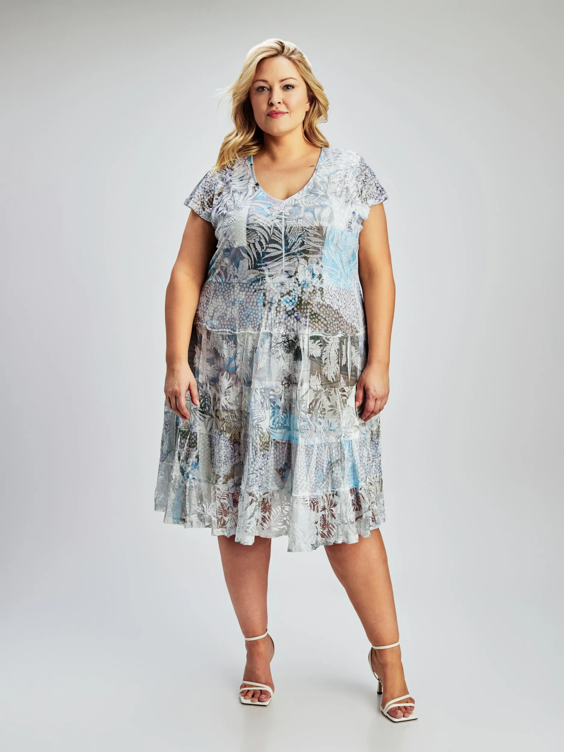 Flared midi knit dress sold by Claire France