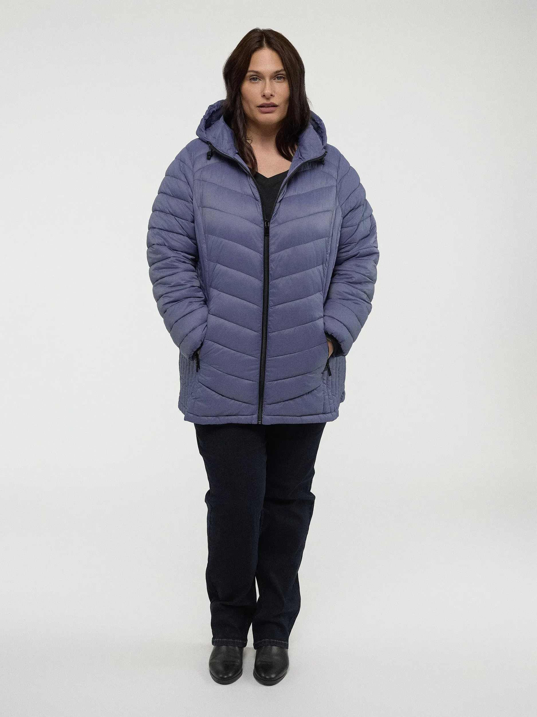 Semi-fitted mid-thigh coat sold by Claire France