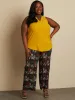 Sleeveless flared tunic sold by Claire France