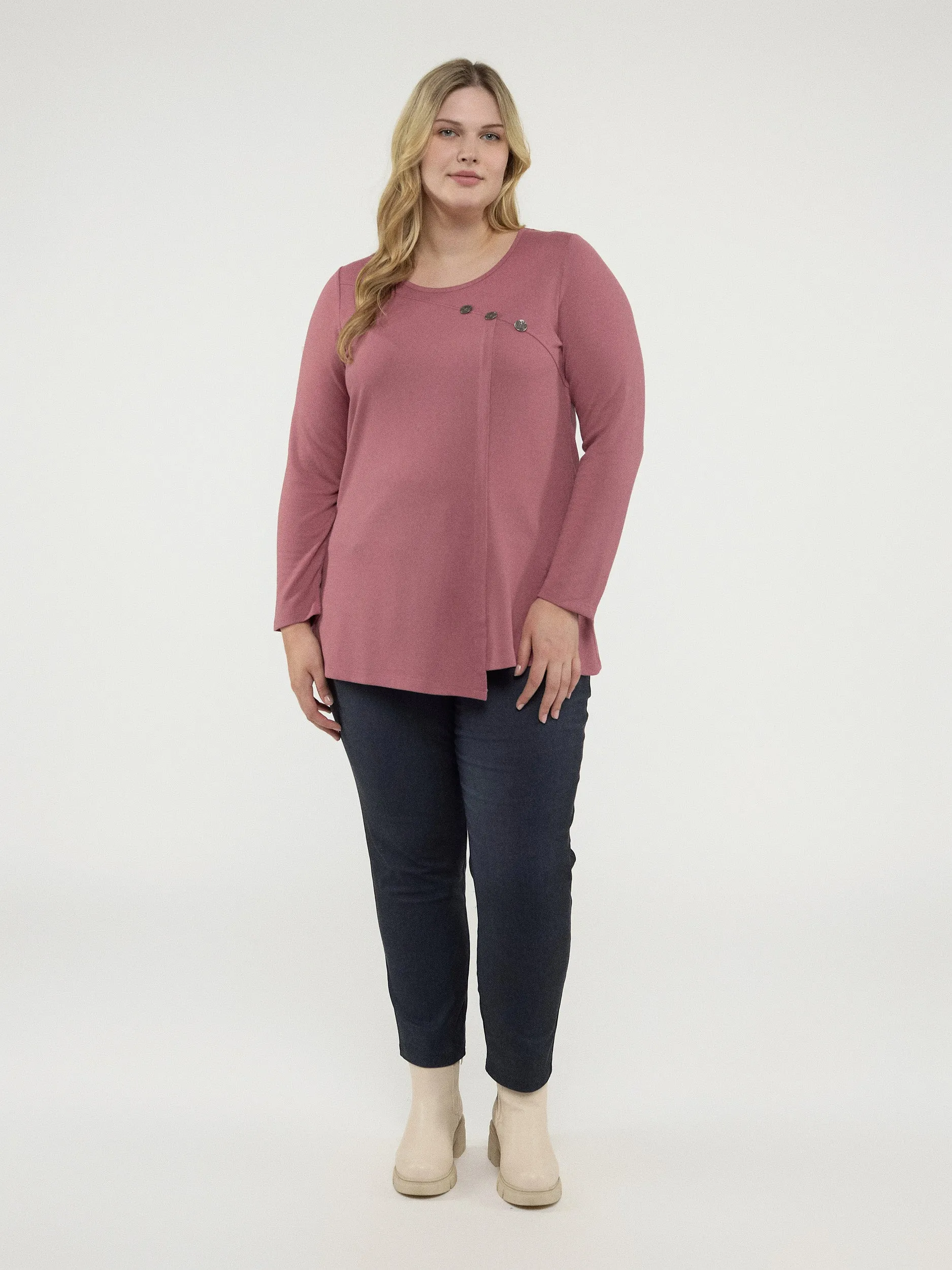 Long-sleeve semi-fitted knit tunic sold by Claire France