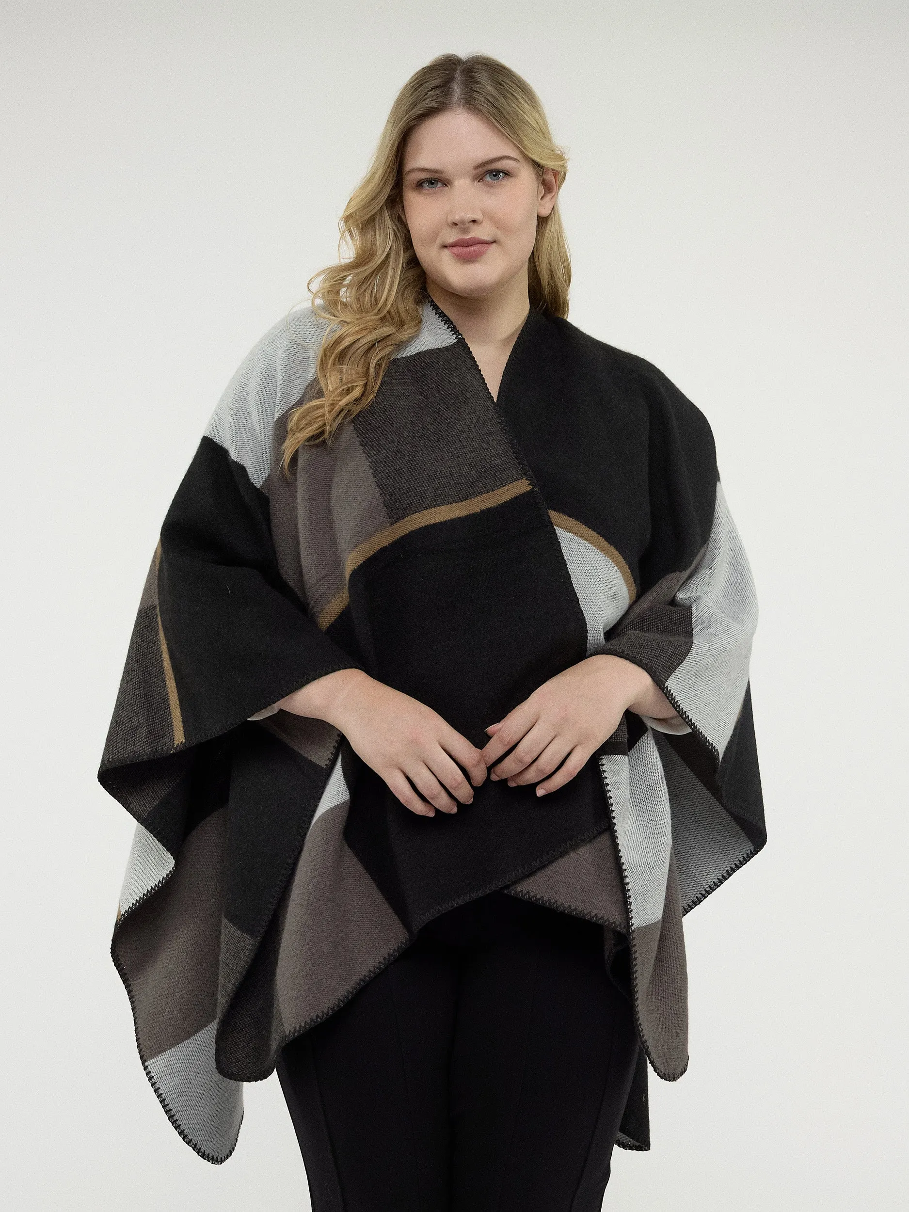 Knit Poncho sold by Claire France