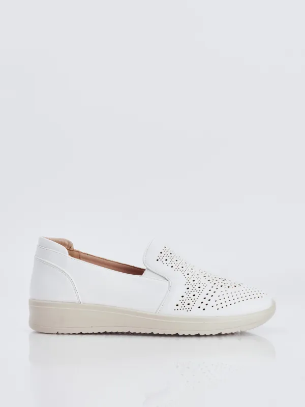Slip-on shoe sold by Claire France