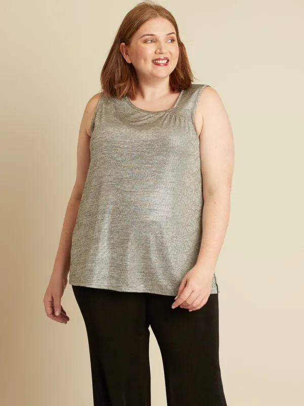 Sleeveless flared tunic sold by Claire France