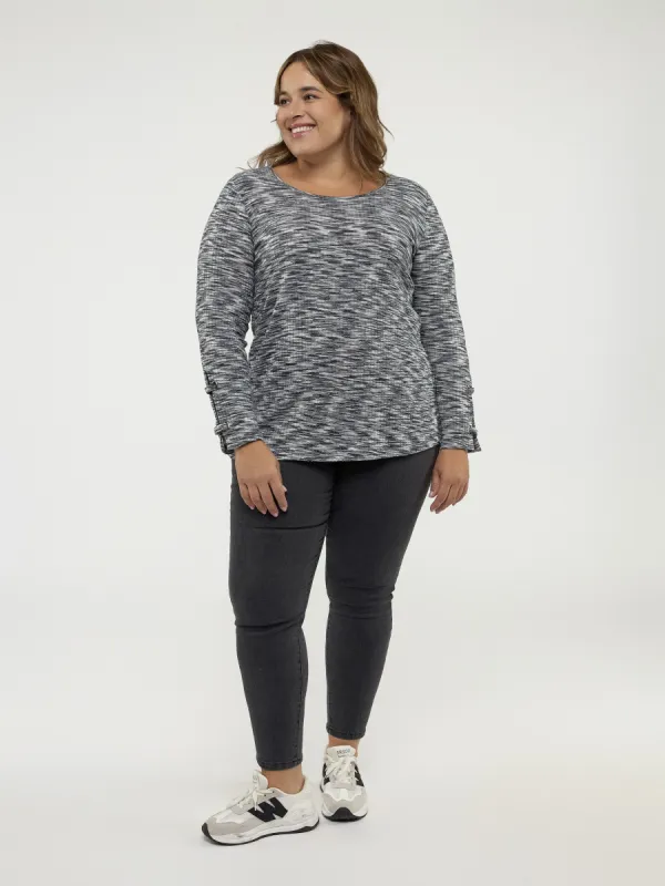 Long-sleeve semi-fitted knit tunic sold by Claire France