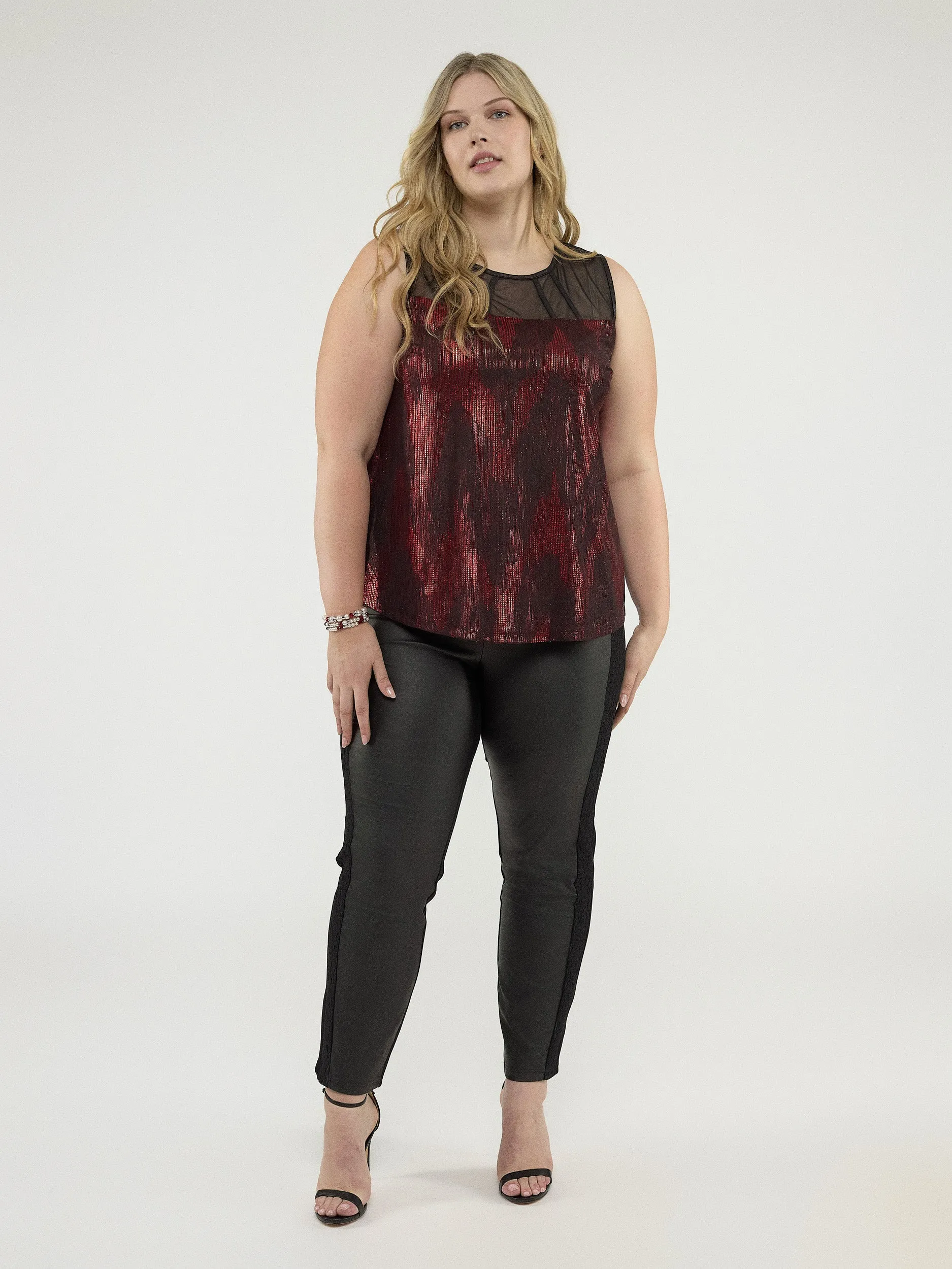 Flared tank top sold by Claire France