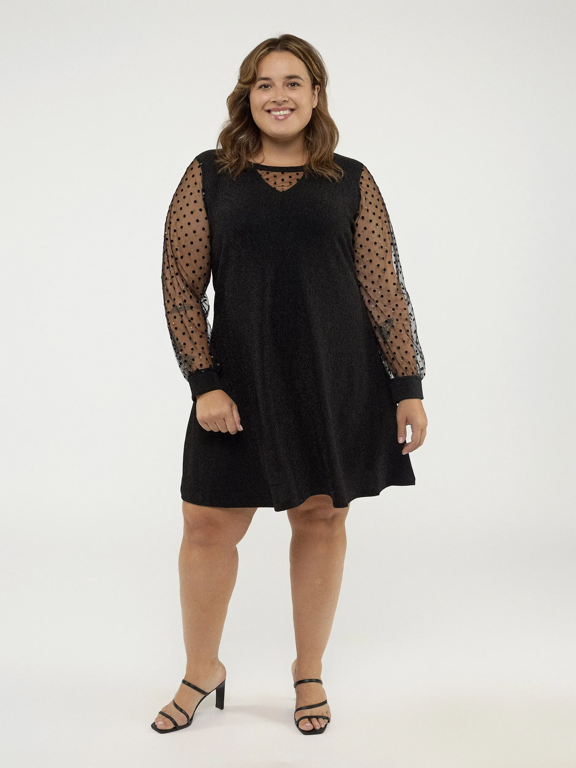 Flared midi knit dress sold by Claire France