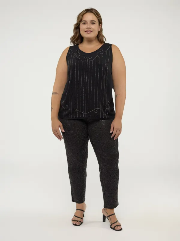 Semi-fitted tank top sold by Claire France